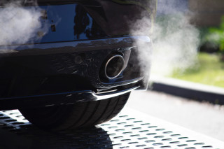 What does white smoke from exhaust mean?